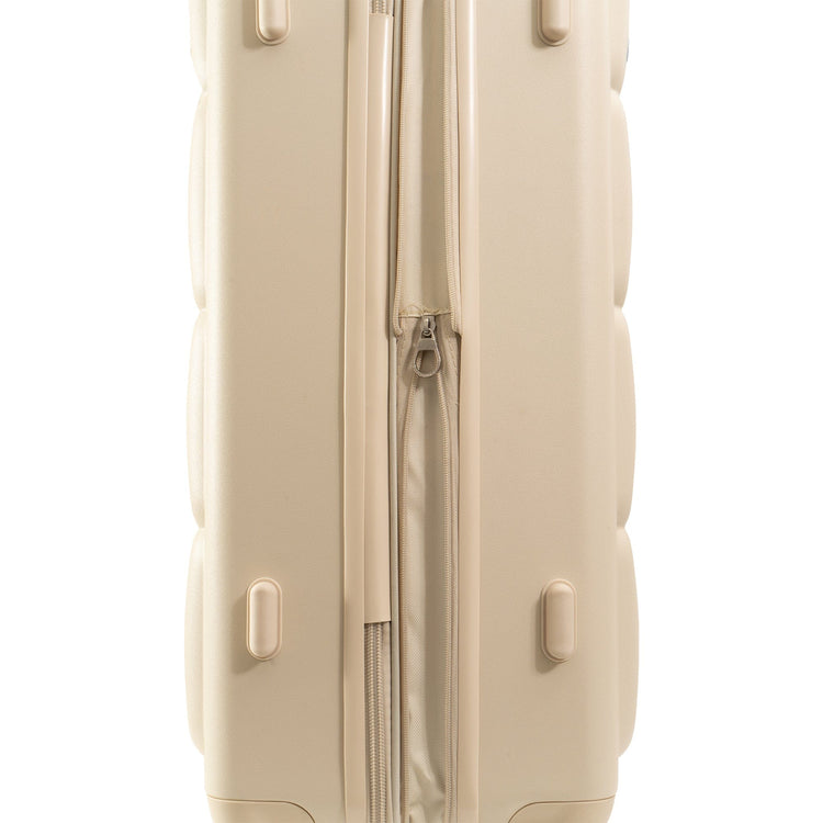 Beige suitcase with a zipper on a white background