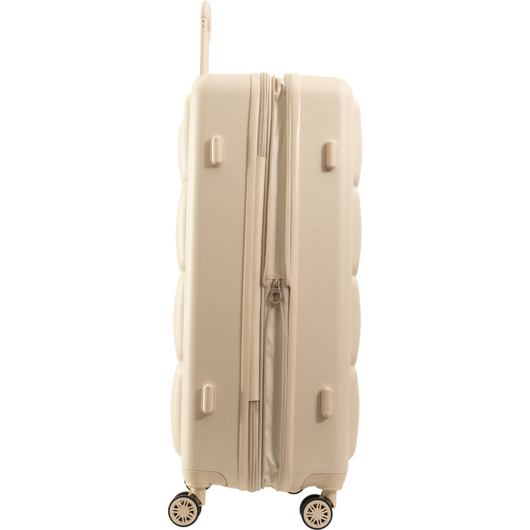 Beige suitcase with a clear cover on a white background