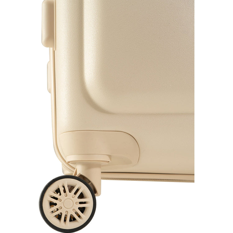 Close-up of a beige suitcase with a wheel on a white background