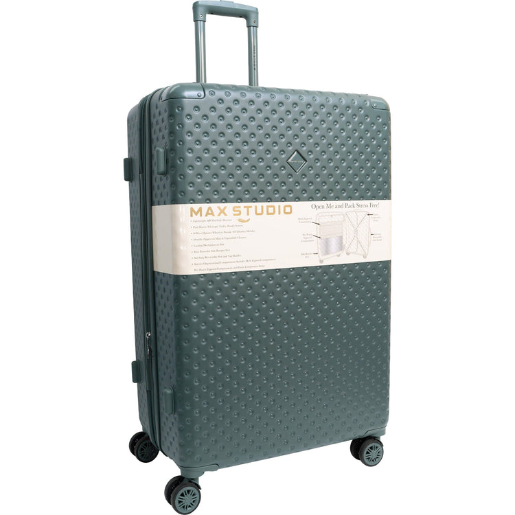 Green suitcase with 'Max Studio' label on a white background