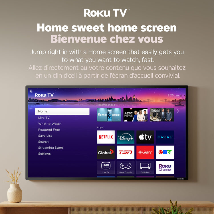 Roku TV home screen on a wall with branding and text.