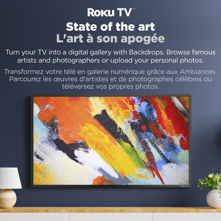 Roku TV with colorful abstract art display on a dark blue wall.