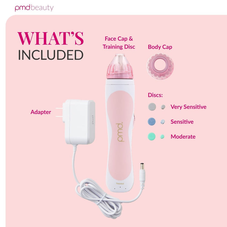 PMD beauty device with components on a pink background