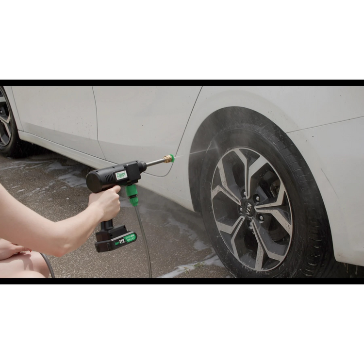 Person using a tool on a car tire