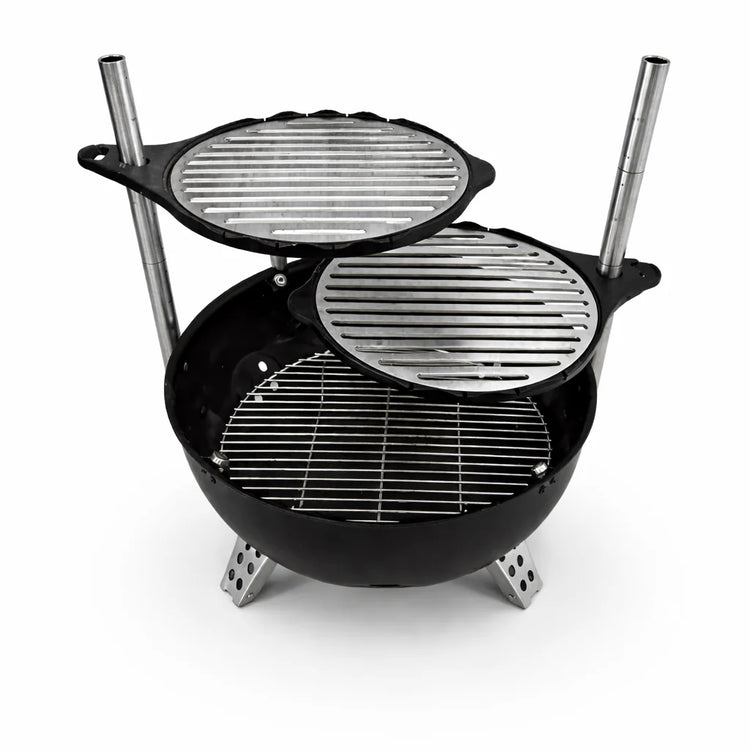 Black portable grill with multiple levels on a white background
