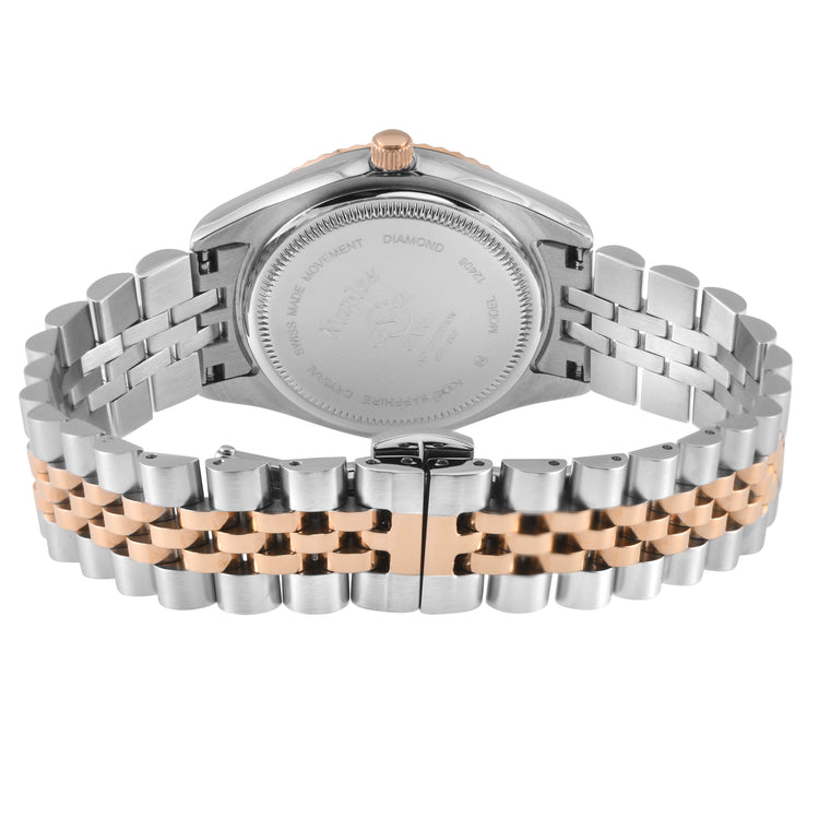 Silver and rose gold watch with a detailed band on a white background