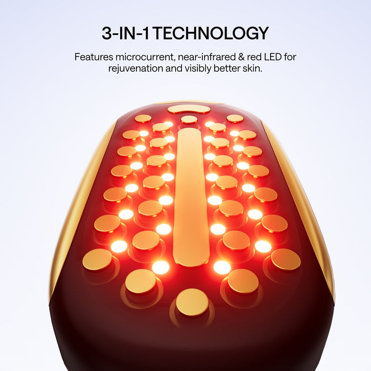 Beauty device with red and gold design on a light gray background