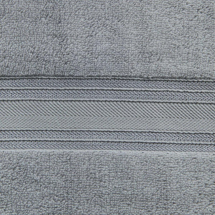 Close-up of gray fabric with a zipper
