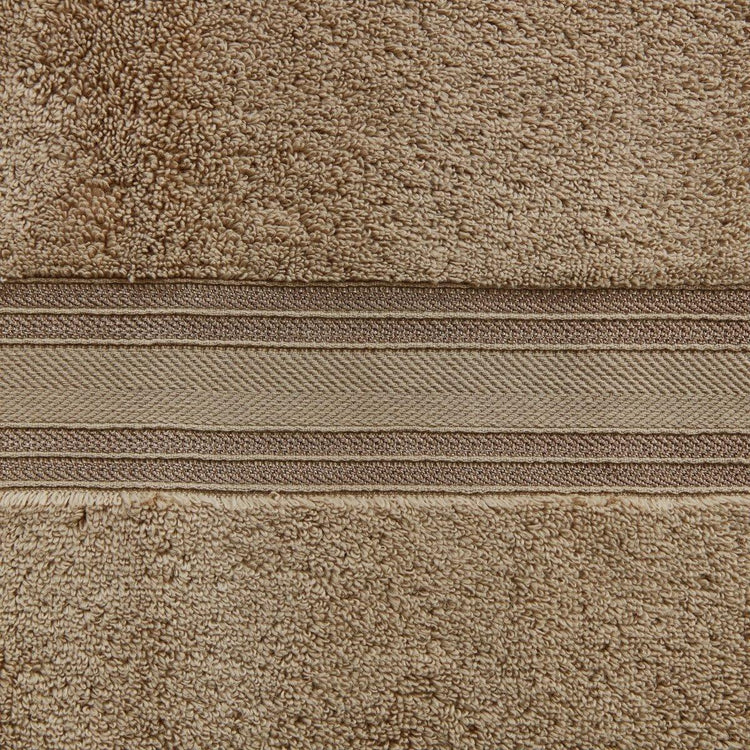 Close-up of beige textured fabric with a zipper