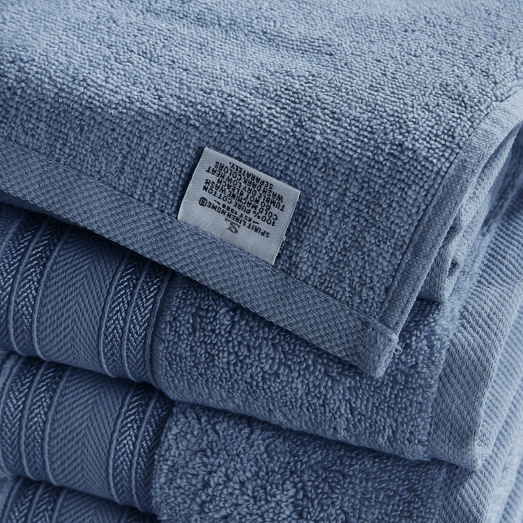 Stack of blue towels with a label on top