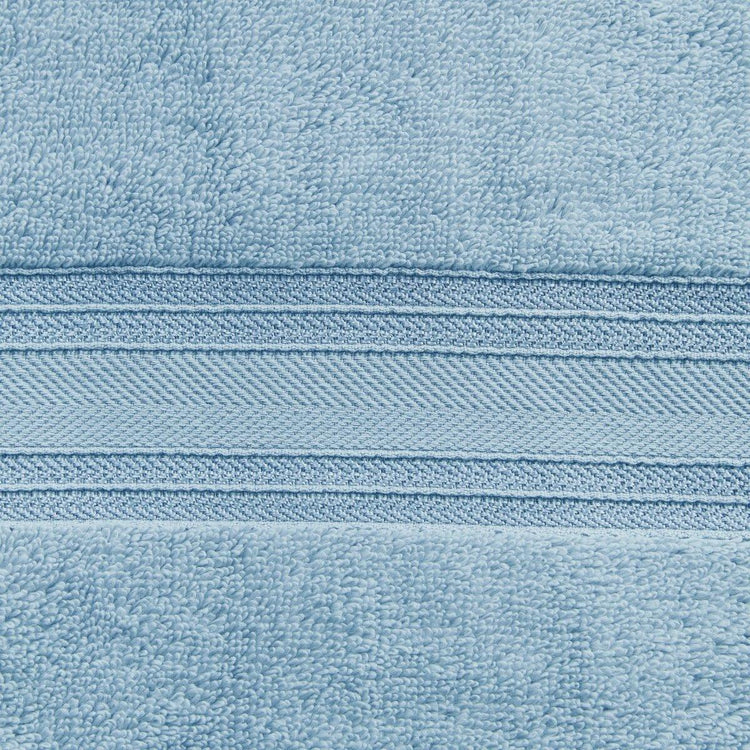 Close-up of a light blue towel with a textured surface