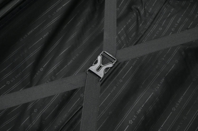 Close-up of a seat belt buckle on a textured black background