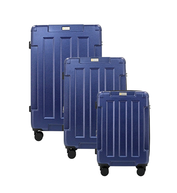 Set of three blue suitcases of different sizes on a white background