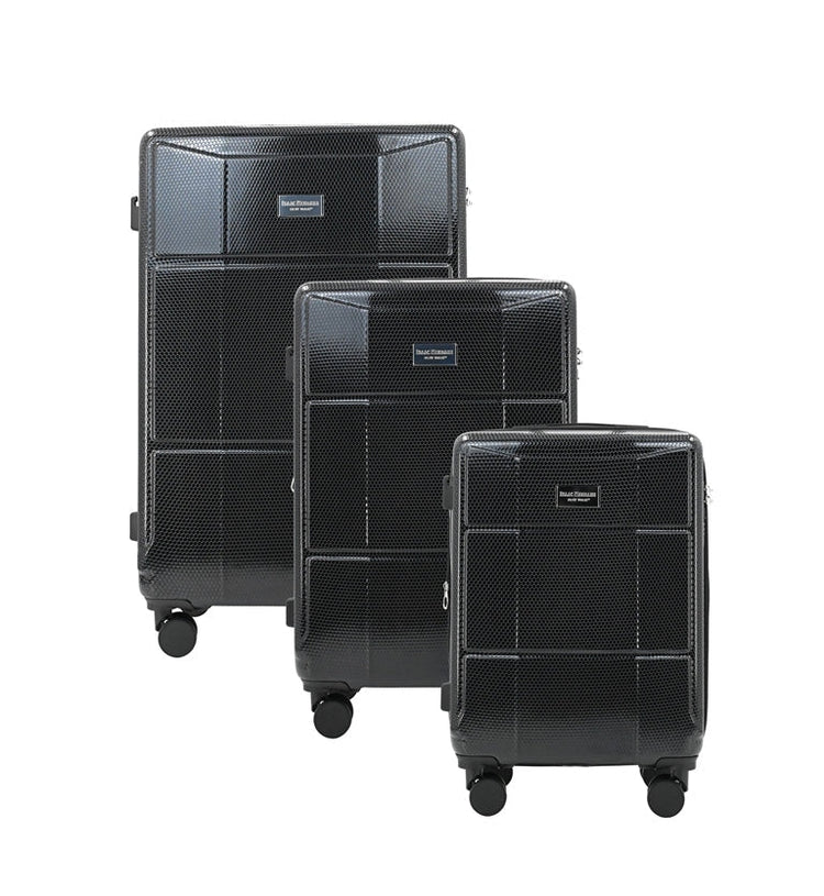 Set of three black suitcases of different sizes on a white background