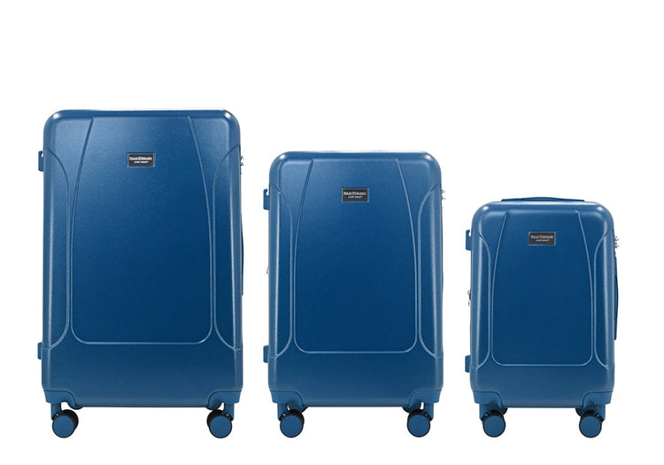 Three blue suitcases of different sizes on a white background