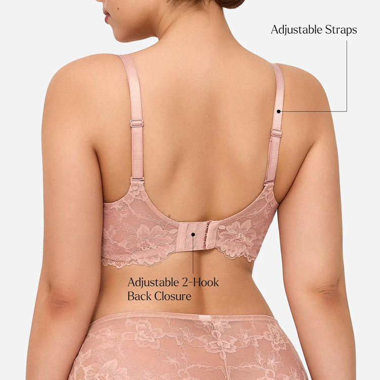 Rear view of a woman wearing a light pink floral lace bra with adjustable straps and a hook-and-eye back closure, with text callouts pointing to the straps and back closure.