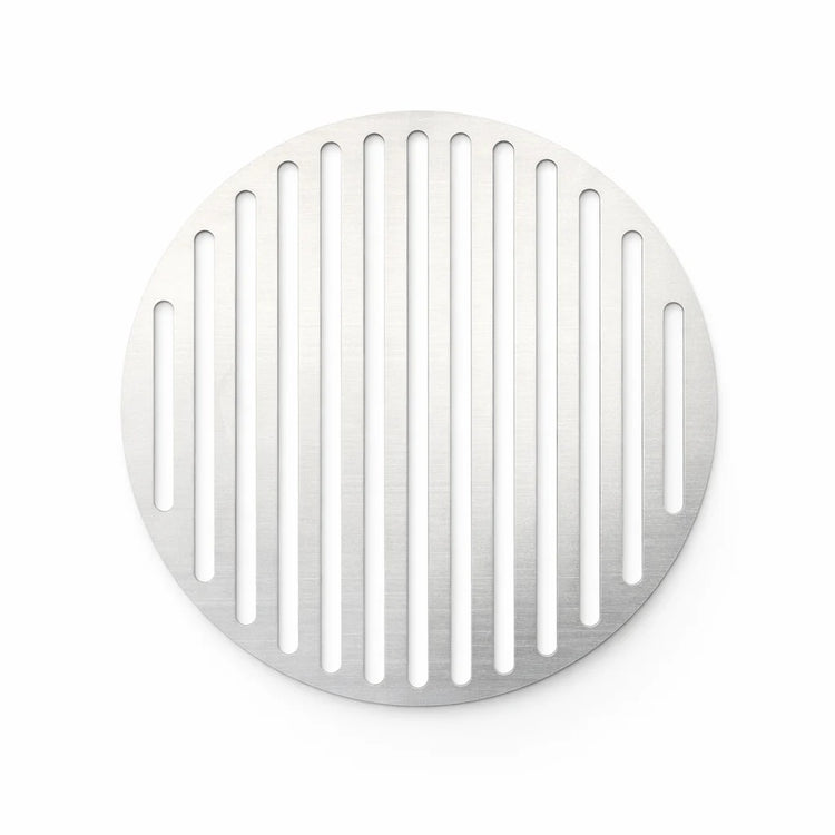 Round metal drain cover with vertical slits on a white background