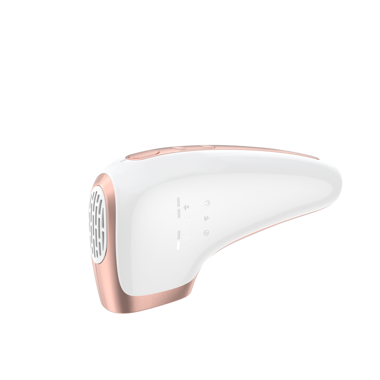 White and rose gold hair removal device on a white background