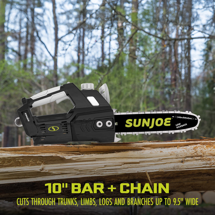 Sun Joe chainsaw on a log with a forest background