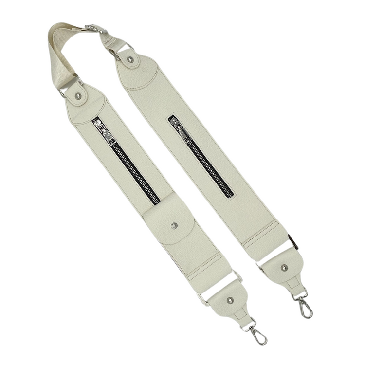 Adjustable black strap with zipper pockets and D-ring tabs, made of pebbled imitation leather, designed to be worn over the shoulder.