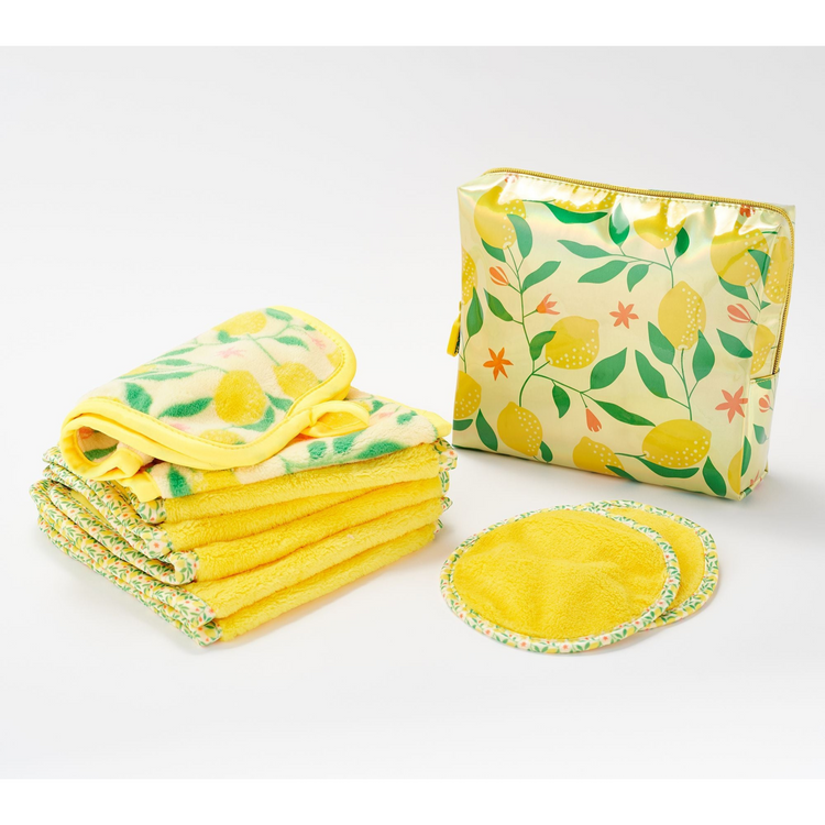 A set of nine makeup remover towels with a geometric pattern, displayed alongside a matching cosmetic bag, all in shades of pink and blue.
