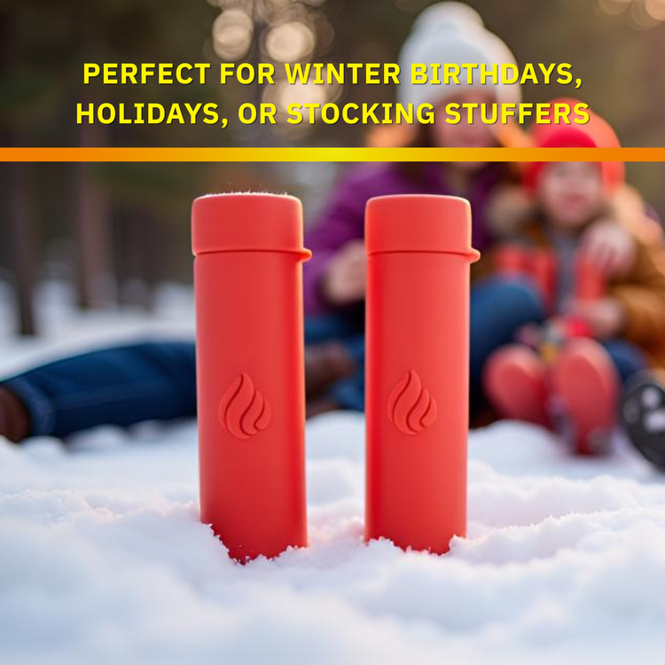 Two red cylindrical items with a flame design on a snowy ground, with text about winter birthdays and holidays.