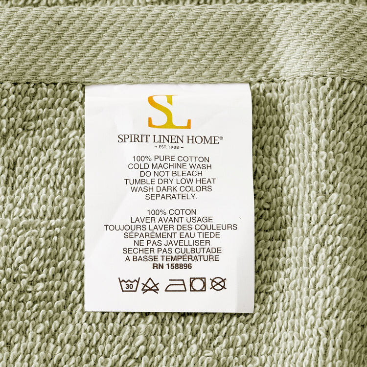 Fabric label with 'Spirit Linen Home' branding on a textured fabric background