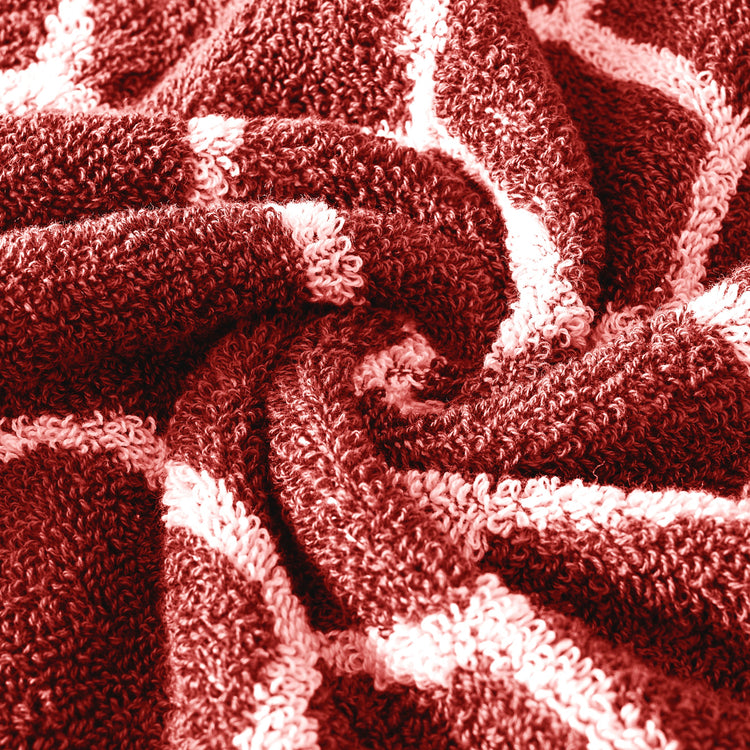 Close-up of textured fabric with a red-brown color scheme