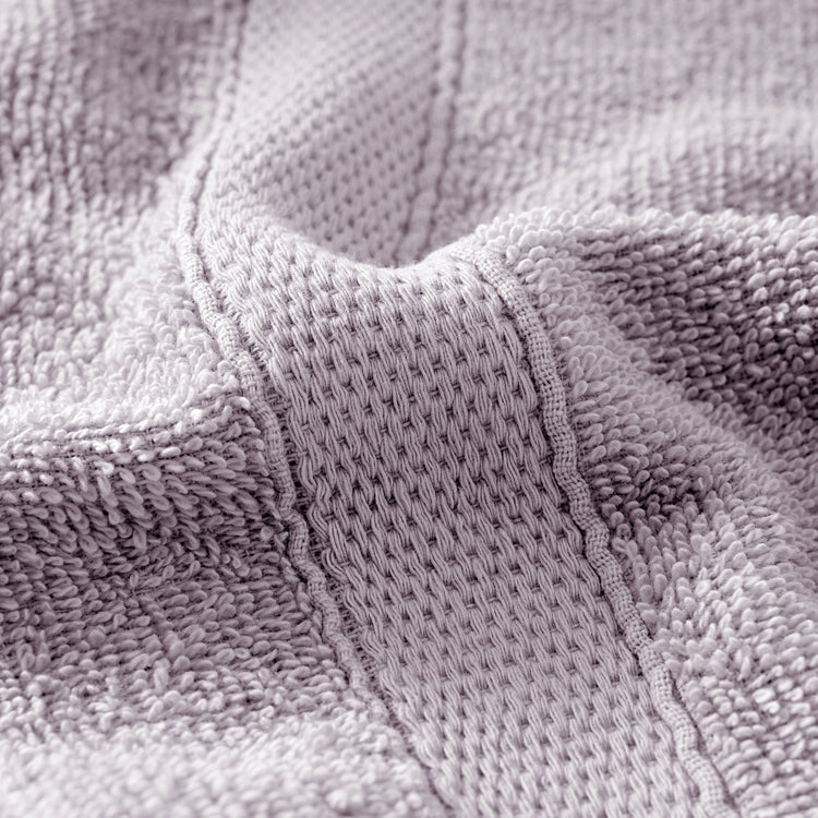 Close-up of a textured gray fabric surface