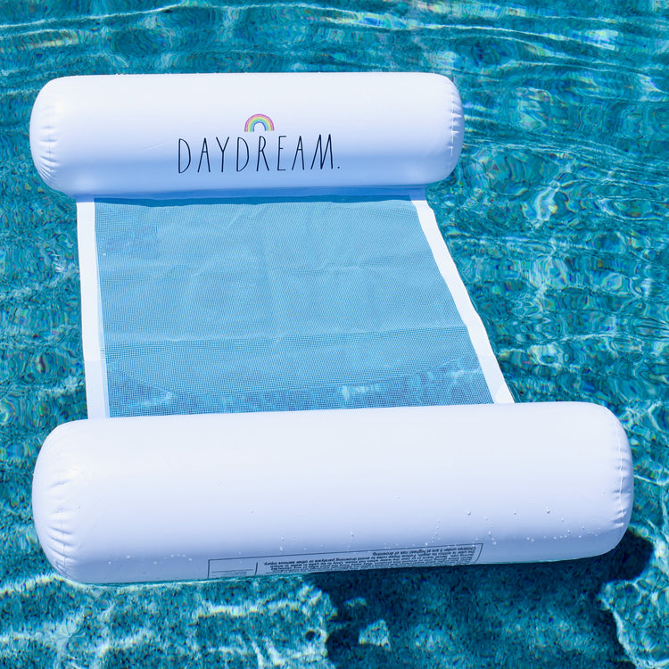 Inflatable pool lounge with 'DAYDREAM' branding floating on water