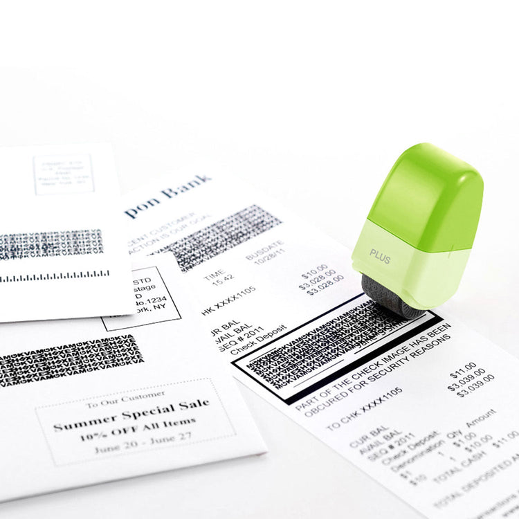 Green stamp on a document with printed text and barcodes