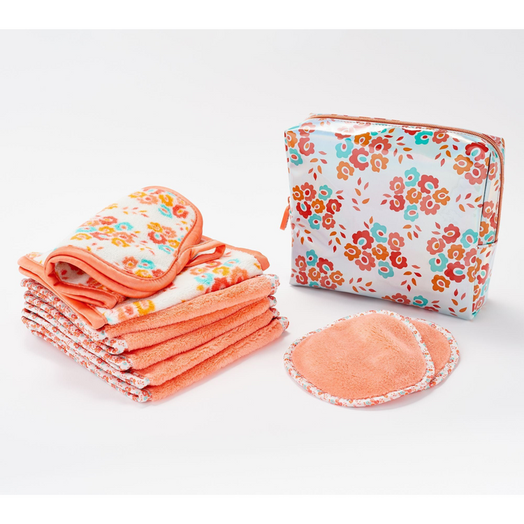 A set of nine makeup remover towels with a geometric pattern, displayed alongside a matching cosmetic bag, all in shades of pink and blue.