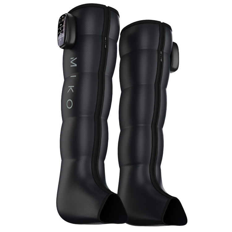 Black knee-high boots with 'MIKO' branding on a white background