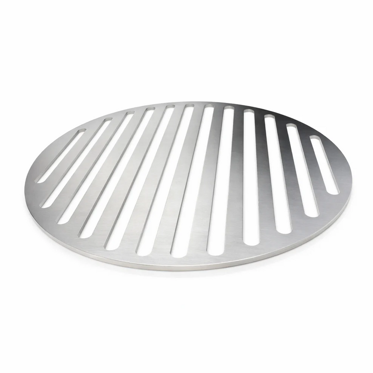Round metal grill grate on a white background