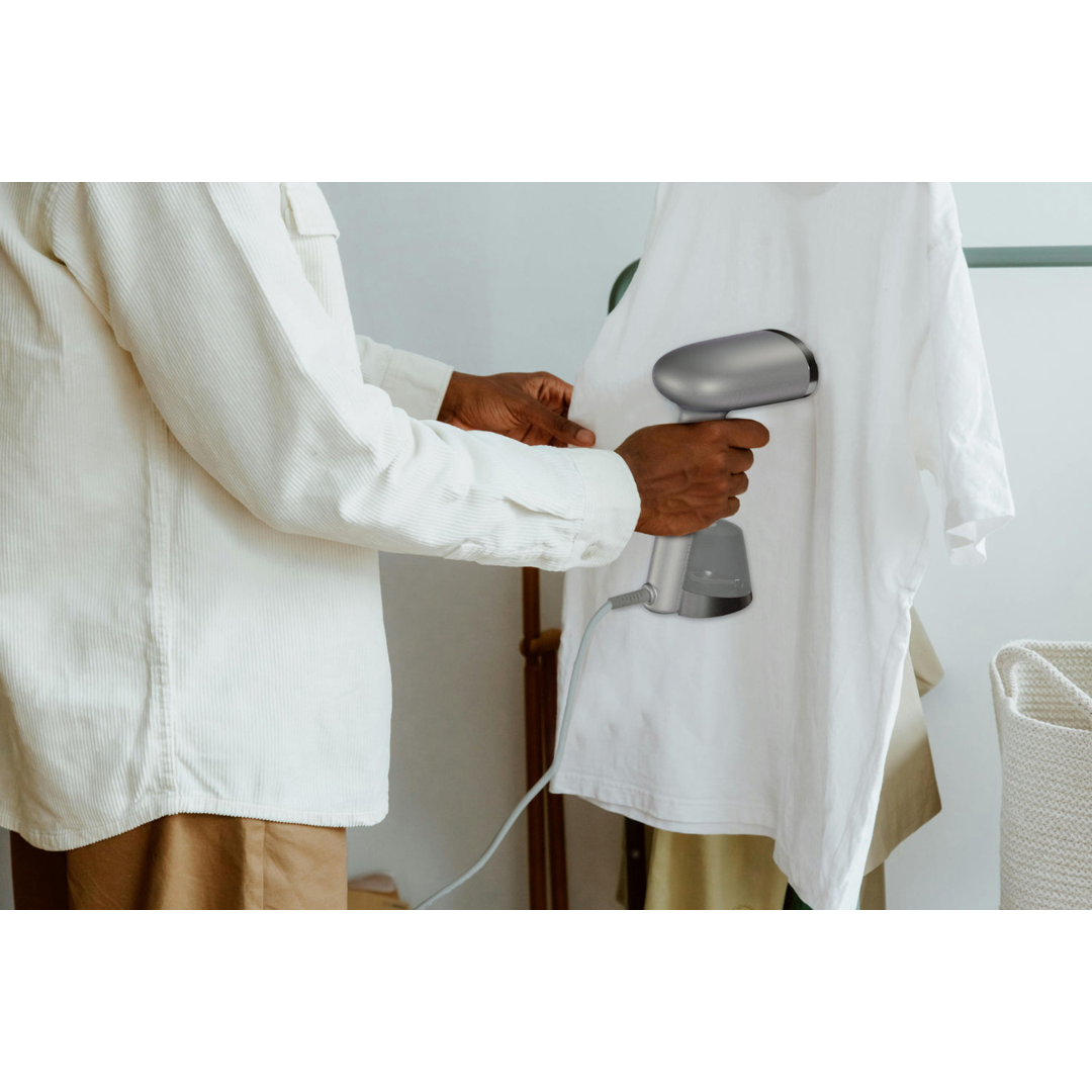 Man ironing a t shirt
