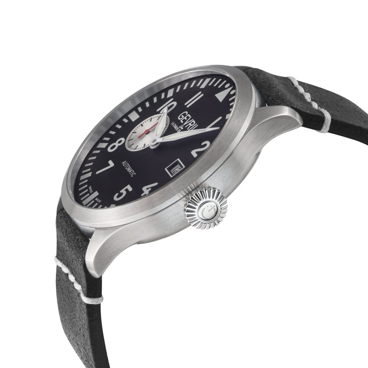 Watch with black dial and leather strap on a white background