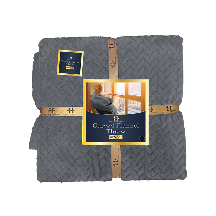 Gray flannel throw blanket with brand label on a white background