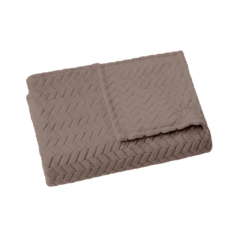 Folded brown textured blanket on a white background