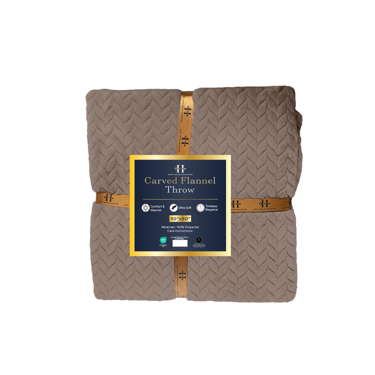 Folded brown flannel throw blanket with a label on a white background