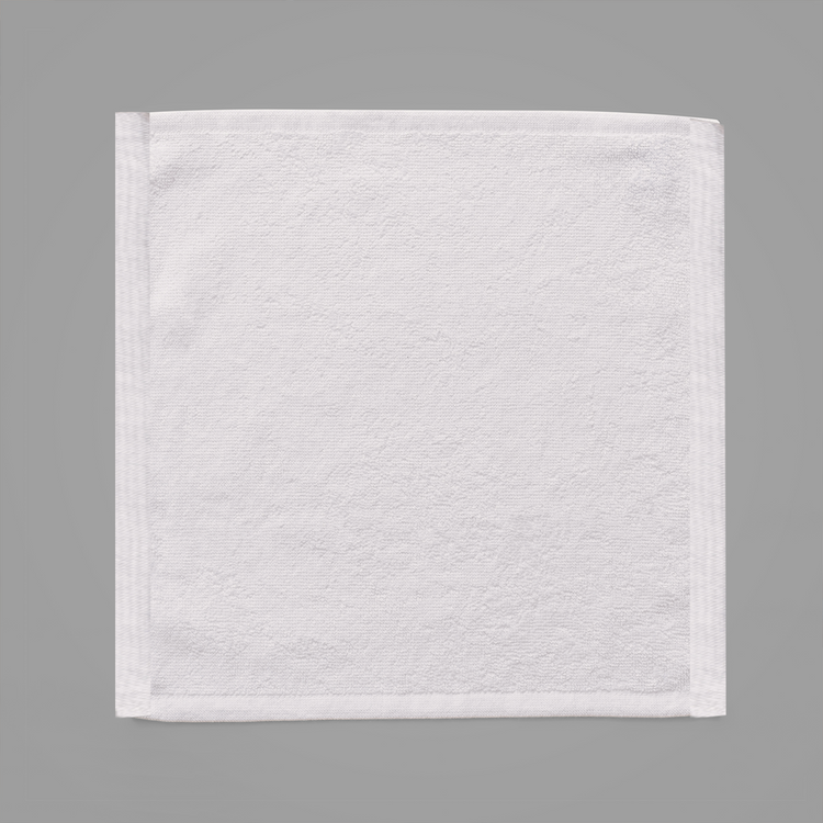 White textured square towel on a gray background