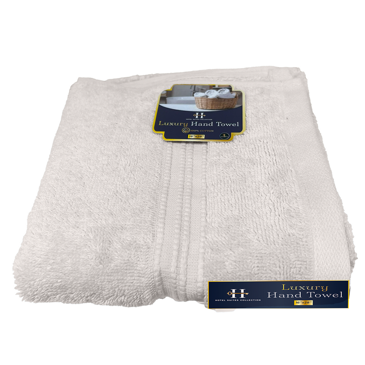 Stack of white luxury hand towels with brand label on a white background