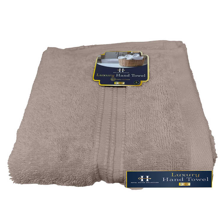 Folded beige towel with 'Luxury Hand Towel' label on a white background