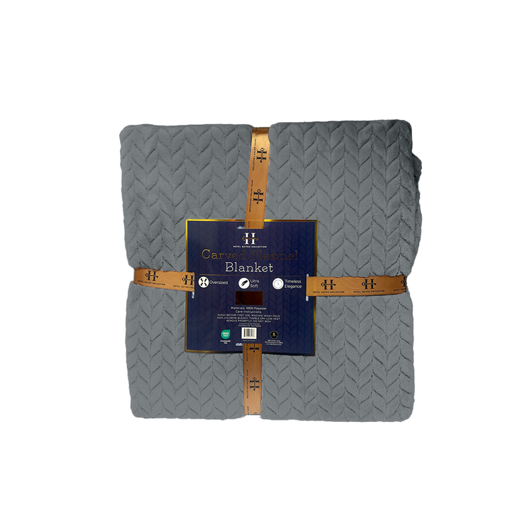 Gray blanket with a brown strap and label on a white background