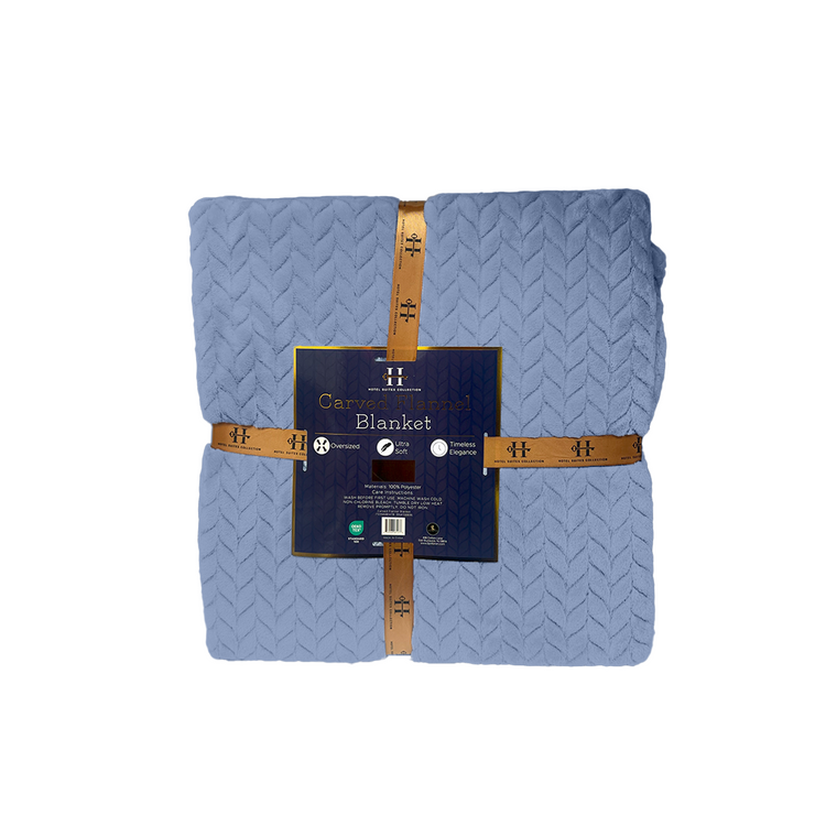 Folded blue blanket with a label on a white background