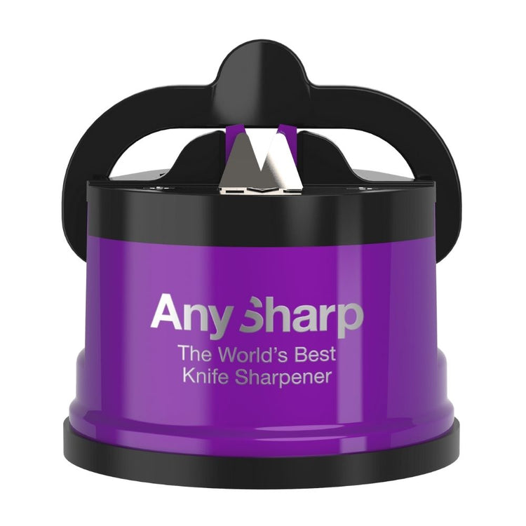 AnySharp Pro Knife Sharpener with a red and black color scheme, attached to a suction cup, being used to sharpen a knife over a kitchen counter.