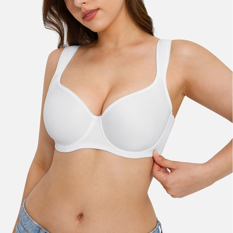 A woman wearing a white wireless underwire bra, shown from the chest to the hips against a light gray studio background.