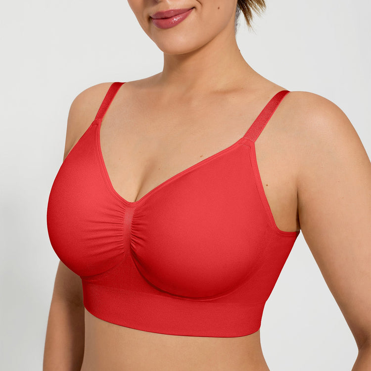 Red bra worn by a model on a plain background