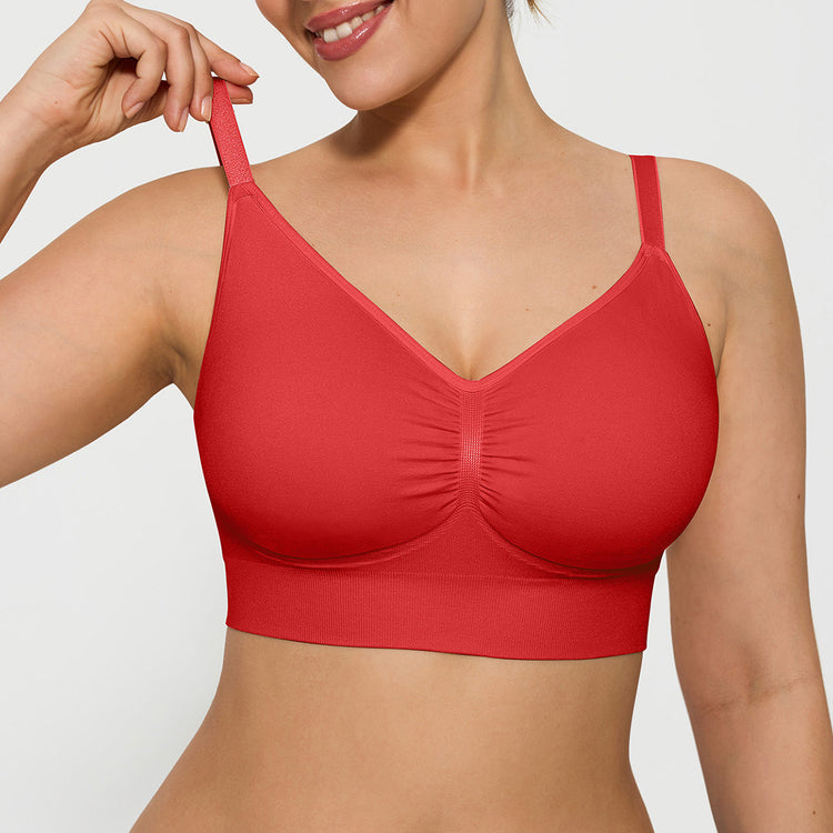 Red bra worn by a person on a light gray background