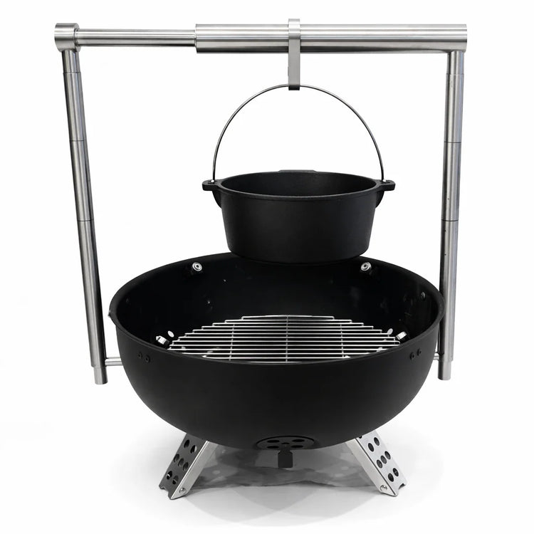 Black charcoal grill with a pot on a white background