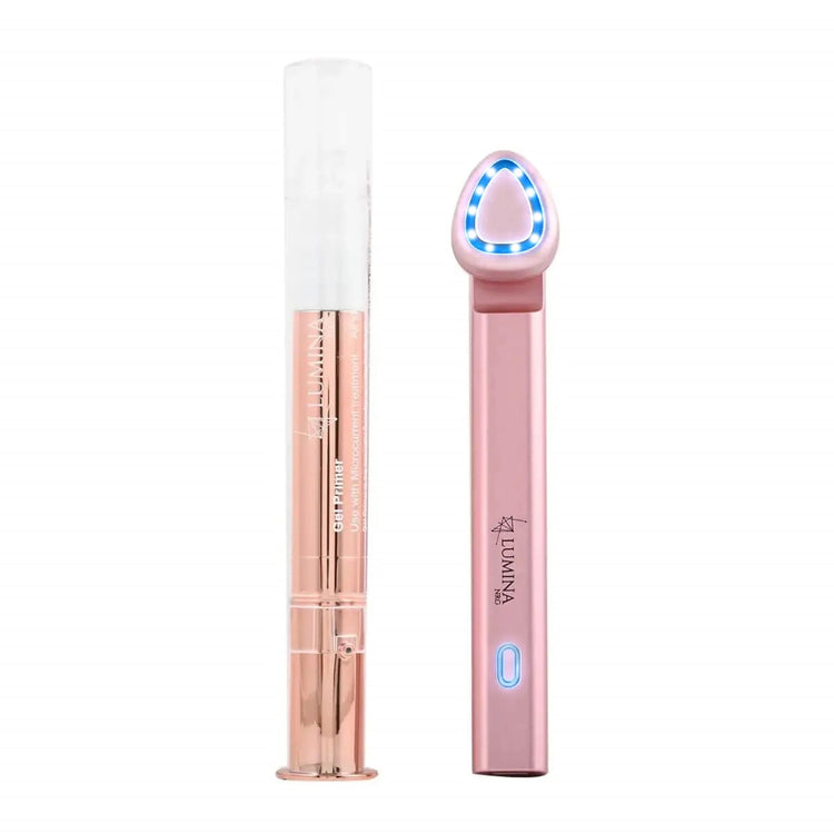 Rose gold dental flosser with white handle on a white background